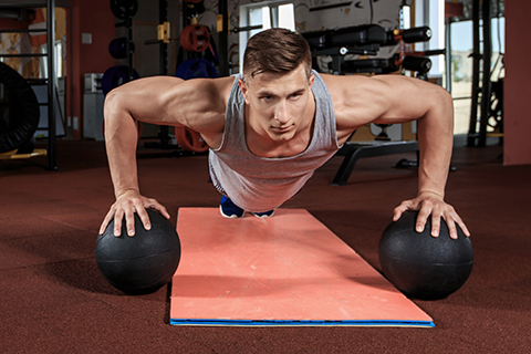 9 Slam Ball Workouts For Cardio, Strength & Endurance